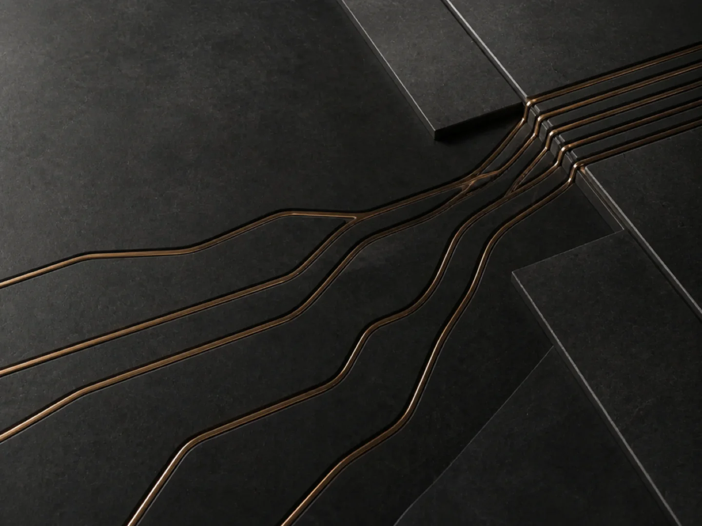 Bronze lines branching and resolving across a dark graphite architectural surface.